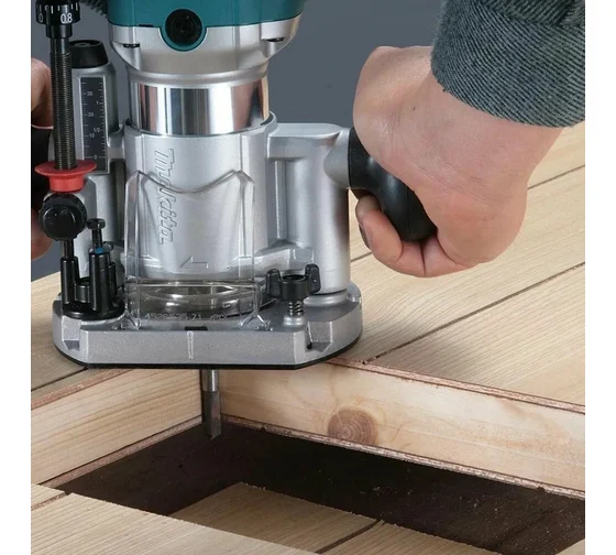 картинка Кромочный фрезер Makita 710 Вт RT0702C от магазина Одежда+